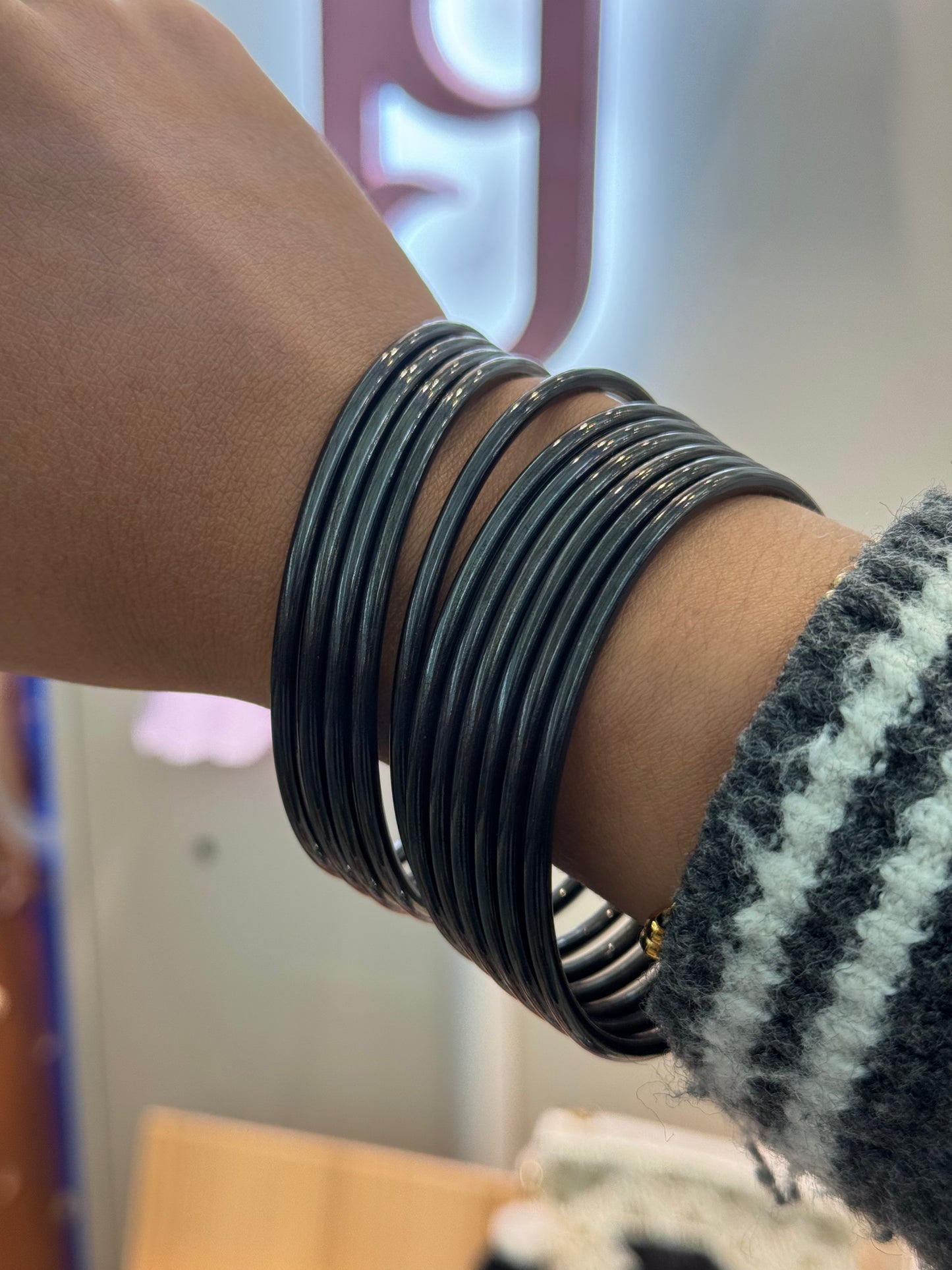 Black noisy bangles