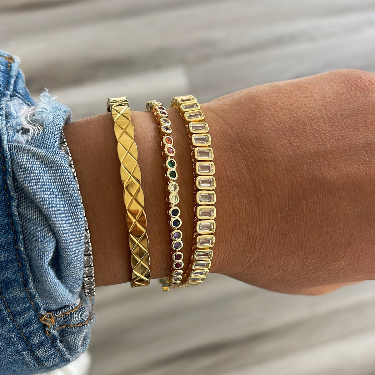 Bezzel rainbow tennis bracelet