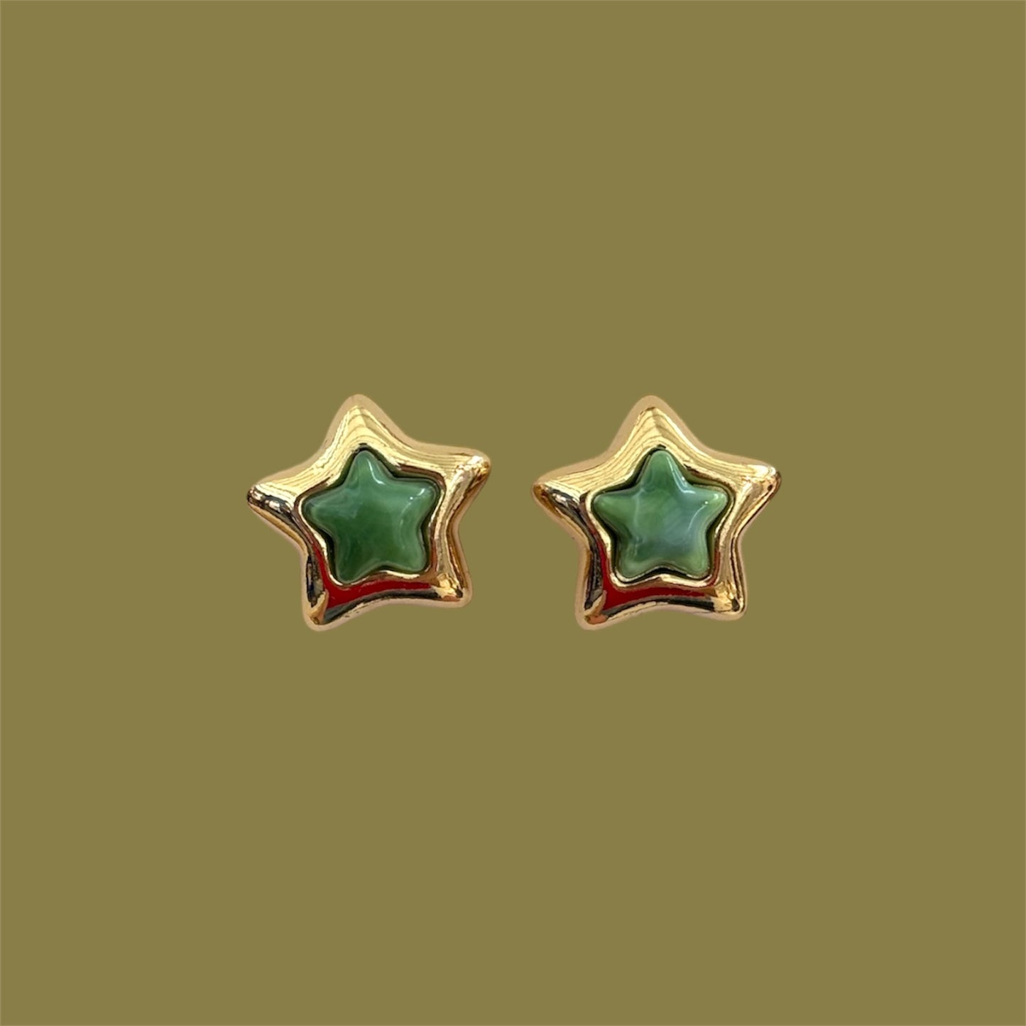 Green star earrings